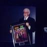 Dick Tufeld receives commemorative framed picture