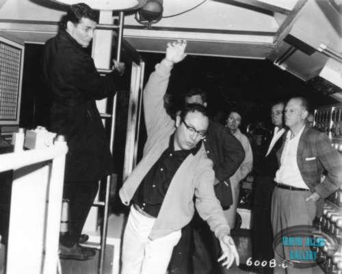 Irwin Allen demonstrates rock, roll, recover