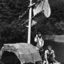 Cameron Mitchell and Martin Milner on the raft