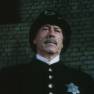 Policeman who catches Adams with Sharkey