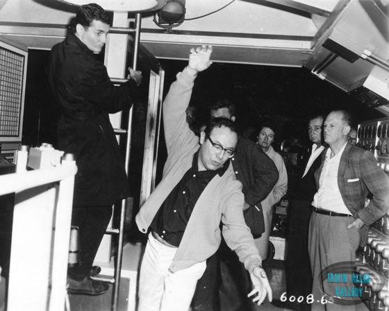Irwin Allen demonstrates rock, roll, recover